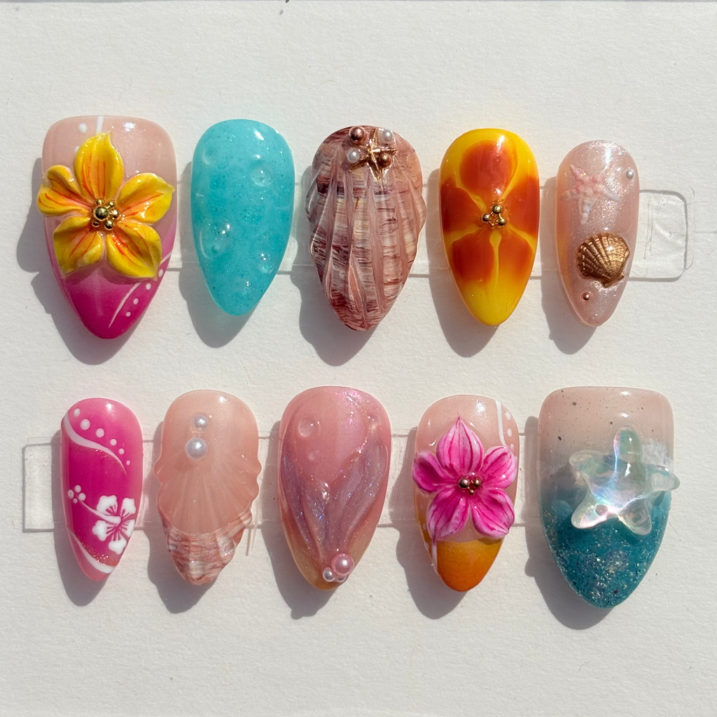 3D Tropical Flowers / Sculpted Seashells / Starfish Charms / Ocean Foam Gradients.