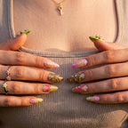 otanical Oasis nails styled with indoor plants, highlighting the vibrant and fresh "greenery" aesthetic.