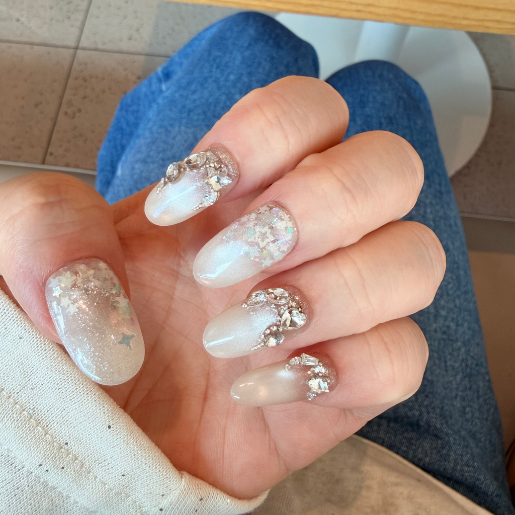 Reusable Swarovski nails, custom celestial press-ons, handmade luxury crystal nails, iridescent star gel nails.