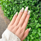 Reusable Swarovski nails, custom celestial press-ons, handmade luxury crystal nails, iridescent star gel nails.